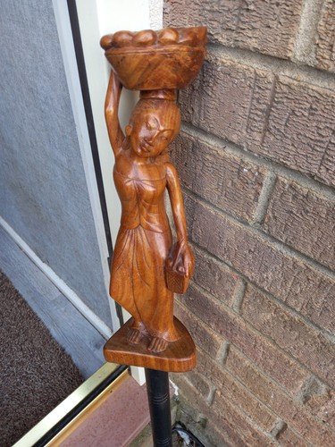 Carved hardwood handle - carved, of